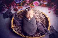Pose 1: Swaddled In Bowl. Hands out.
